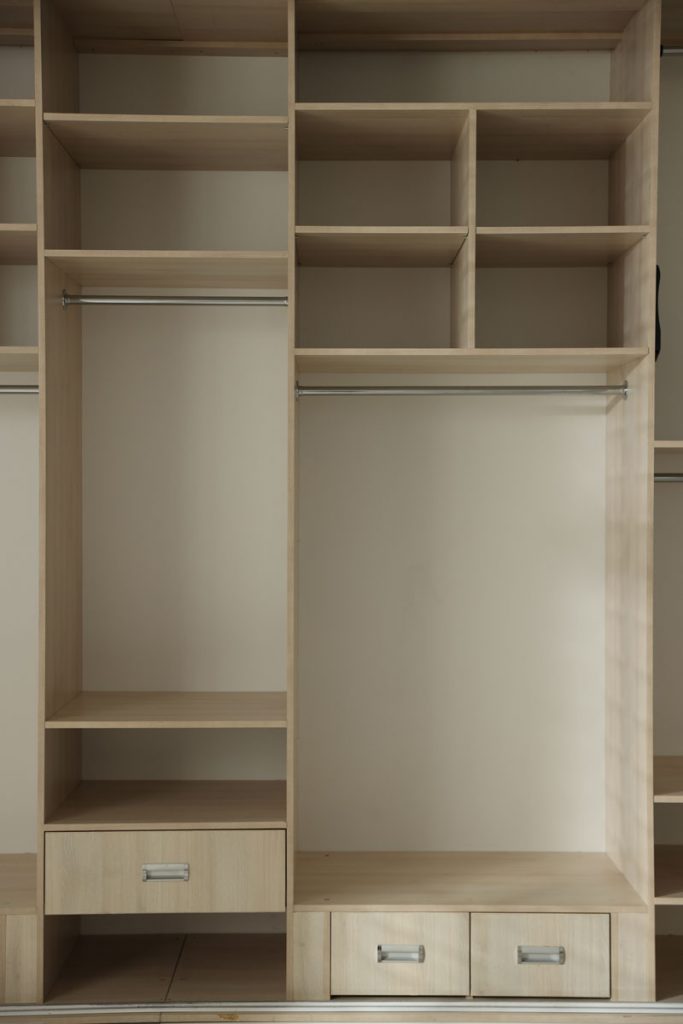 Empty closet shelving cleaned during a professional move-out cleaning service in NYC