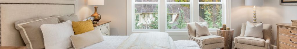 Bright bedroom cleaned and prepared during a professional move-out cleaning service